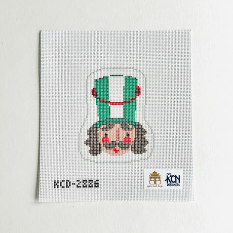 Green Nutcracker Face - The Flying Needles