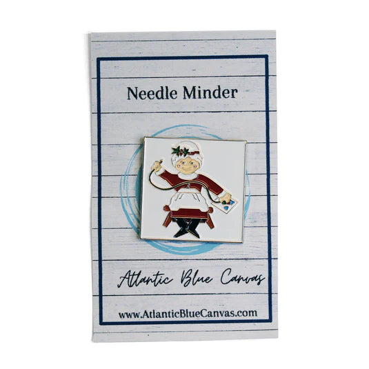 Mrs. Claus Needlepointing Needleminder - The Flying Needles