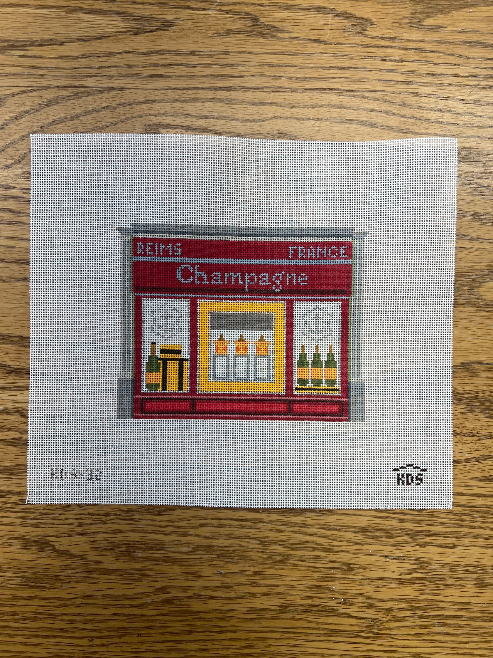 Champagne Storefront - The Flying Needles