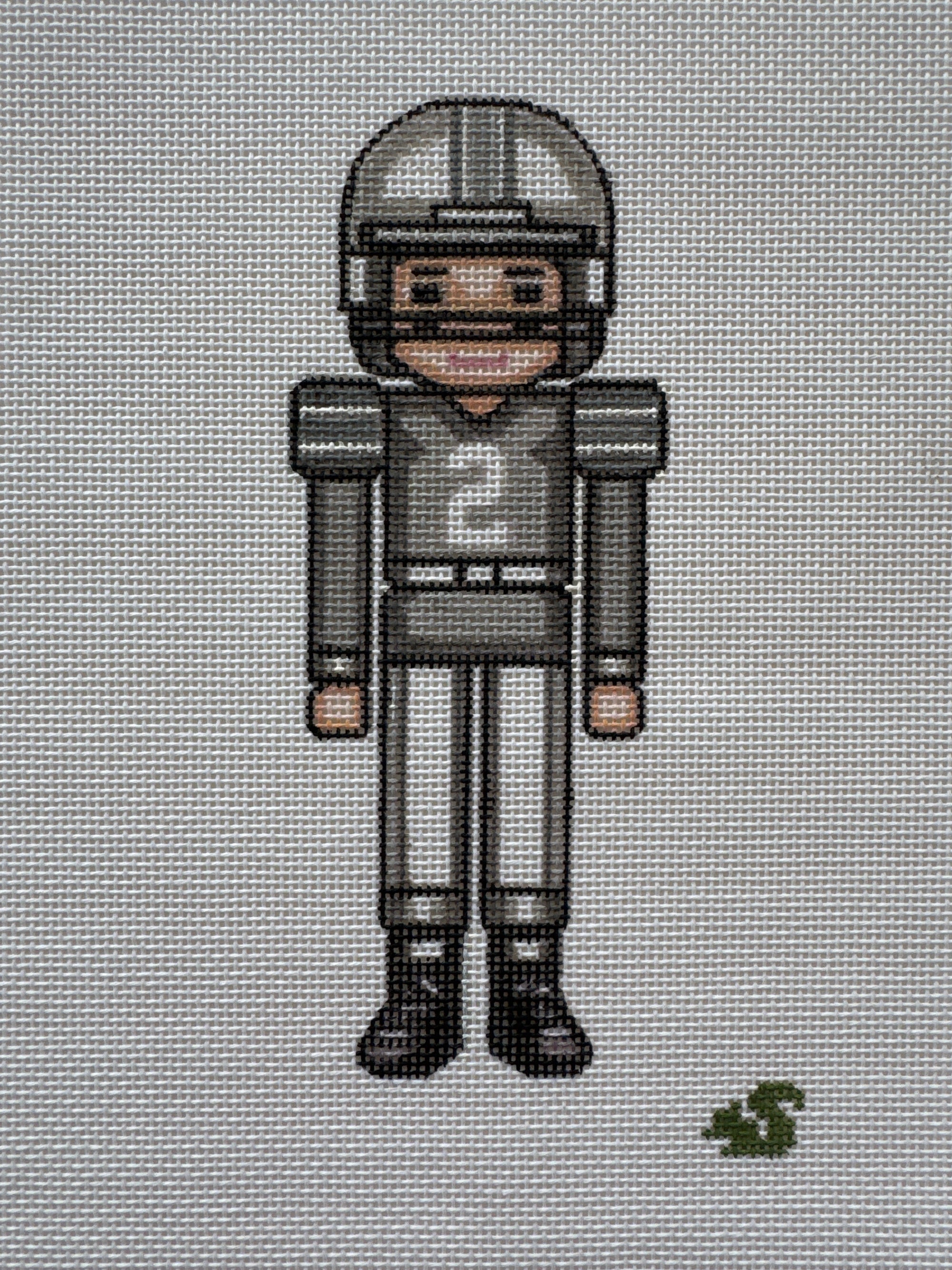 Grayscale Football Nutcracker - The Flying Needles