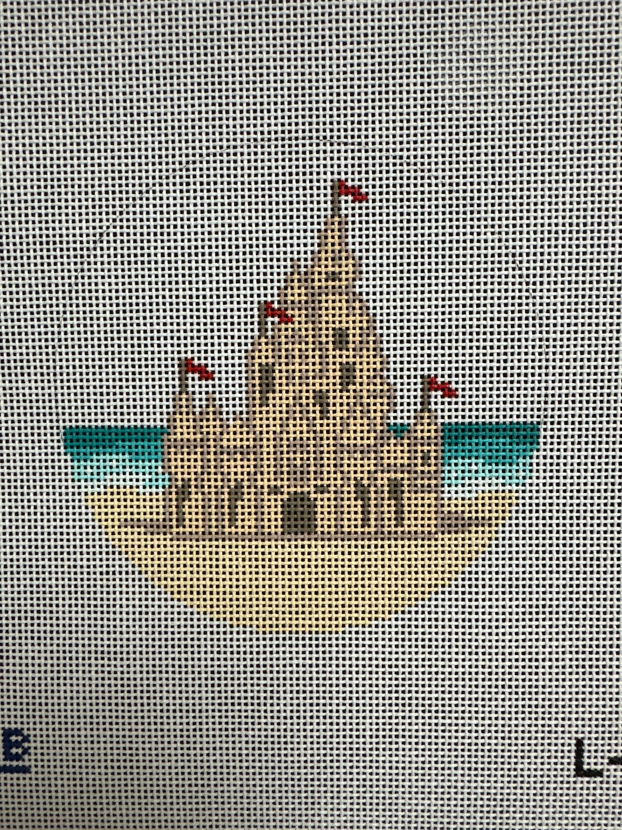 Sand Castle Round - The Flying Needles