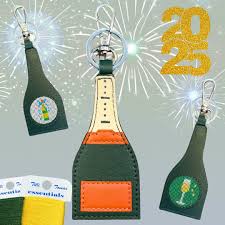 Champagne Bottle Fob - The Flying Needles